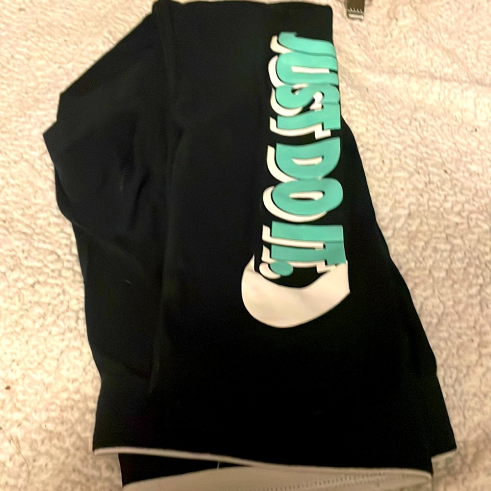 Black Nike Leggings “Just do it” logo. Size M.